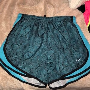 Nike workout shorts, small but fits like a medium